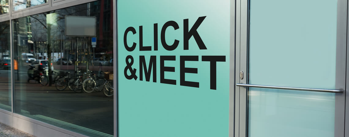Click & Meet Schriftzug am Laden