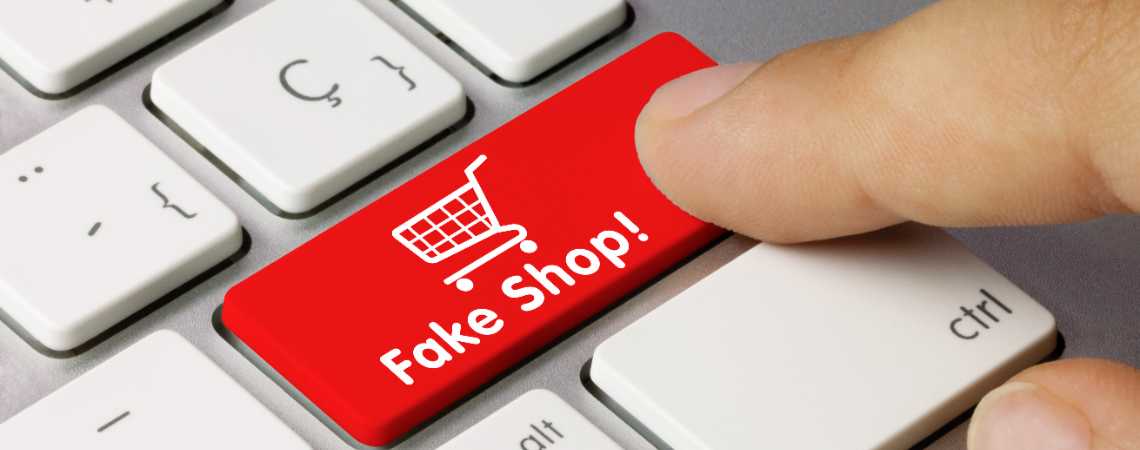 Taste auf einer Tastatur in rot mit der Aufschrift: Fake Shop
