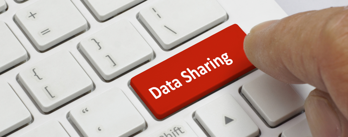 Taste auf Tastatur mit Aufschrift "Data Sharing"